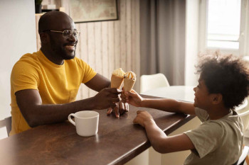 Father and son with ice cream