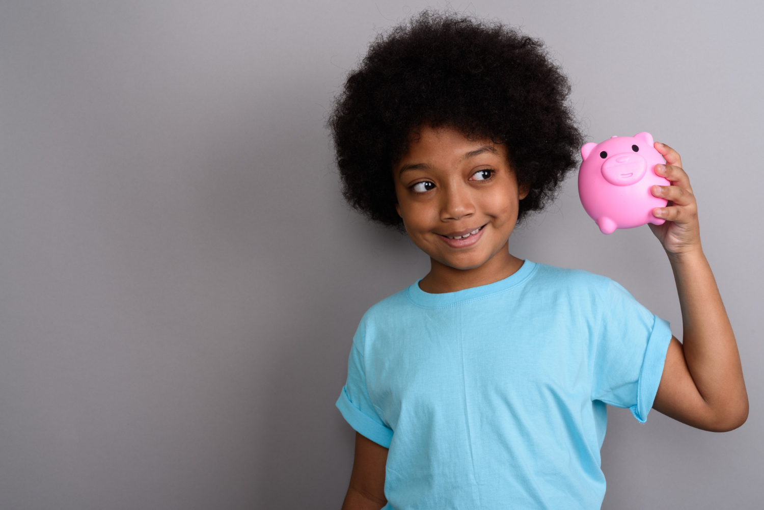 Girl with piggybank